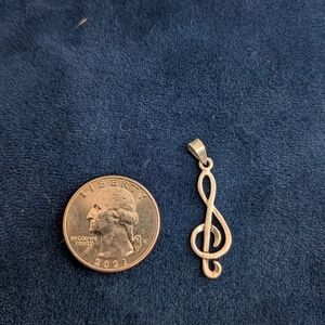 Elegant Sterling Silver Treble Clef Pendant